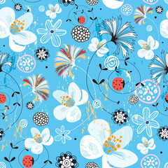 Seamless colorful floral pattern on a bright blue background