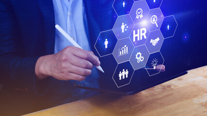 Businessman hand pressing human resources button, Human resources, HR management, employment,...