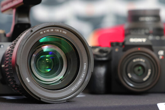 Brand new mirrorless digital camera Sony Alpha 7R  and lenses closeup displayed at a photo workshop.