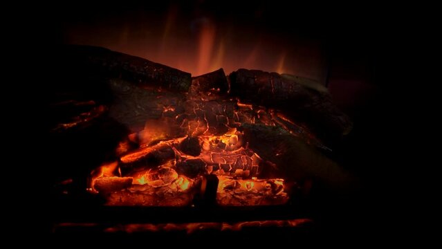 Fire in the fireplace. Flames in the fireside of house.