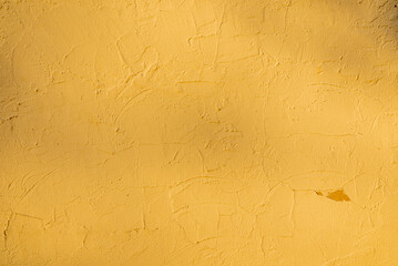 Ocher, sienna, yellow background with shadows. Texture	