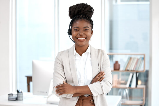 Call center, arms crossed and portrait of black woman in office for communication, consulting and customer service. Help desk, happy and contact us with female employee for sales, online and network