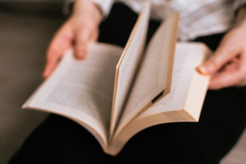 Book pages turning blurred background