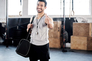 Portrait, thumbs up and happy man in gym with bag for sports goals, fitness target and training....