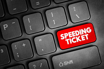 Speeding ticket - a ticket issued for driving above the speed limit, text concept button on keyboard