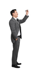 Businessman with marker writing on white background