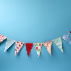 Fototapeta premium String of bunting on blue background, created using generative ai technology