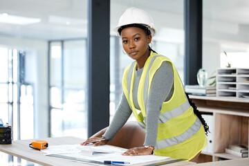 Architecture, planning and blueprint with portrait of black woman in office for engineering,...