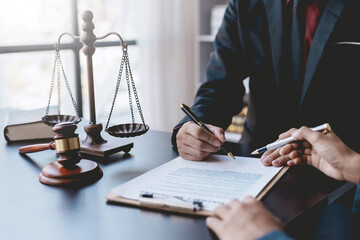 Legal execution department makes an appointment with the customer to sign a mediation agreement to pay the debt. Lawyer discuss the contract document. Treaty of the law. Sign a contract business.
