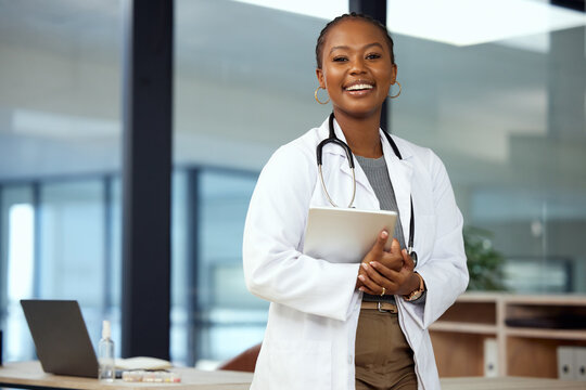 Portrait, doctor and black woman with a tablet, smile and connection with innovation, network and happiness. Face, female person and medical professional with technology, healthcare and happiness