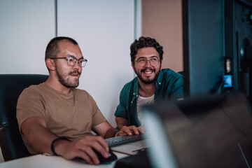 Programmers engrossed in deep collaboration, diligently working together to solve complex problems...