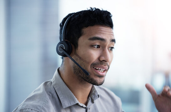 Talking, Call Center And Business Man Telemarketing, Customer Service And Support In Office. Crm, Contact Us And Asian Male Sales Agent, Consultant And Professional Working, Consulting Or Help Desk