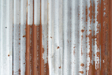 The Rusty zinc sheet texture and background, Reddish brown stain on metallic silver