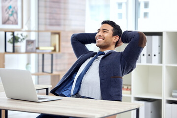 Relax, stretching and happy business man on laptop at desk in planning, working and office or job...