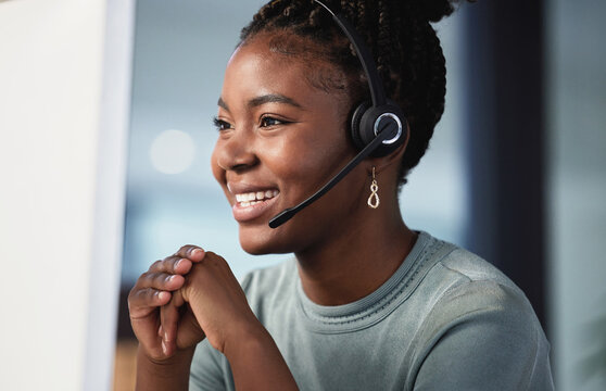 Call Center, Customer Service And Support With A Black Woman Consultant Working In Her Office At Night. Contact Us, Crm And Consulting With A Happy Young Female Employee At Work In Telemarketing