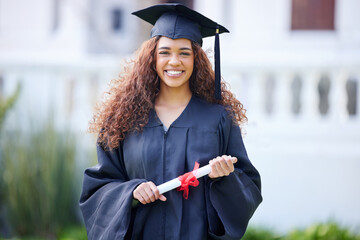 Success, portrait of college student and on graduation day at her campus outside with her...