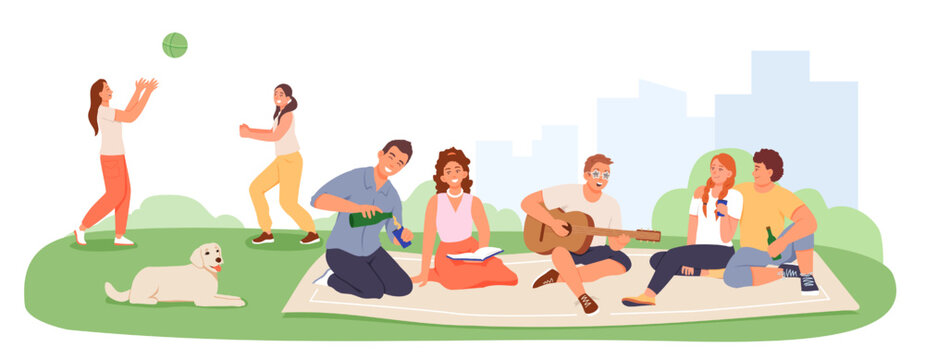 Company rests in nature. Friends had picnic. Young man plays guitar, women play ball, dog lies on grass. Summer leisure in park. Calm and active recreation of young people