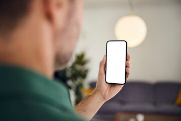 Man looking at blank smartphone display