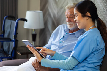 telemedicine. Elderly caucasian man and asian nurse consulting  doctor on virtual video call conference by digital tablet computer at nursing home care.
