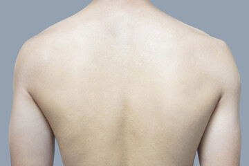 Back of man on blue background beauty healthy skin care for men concept