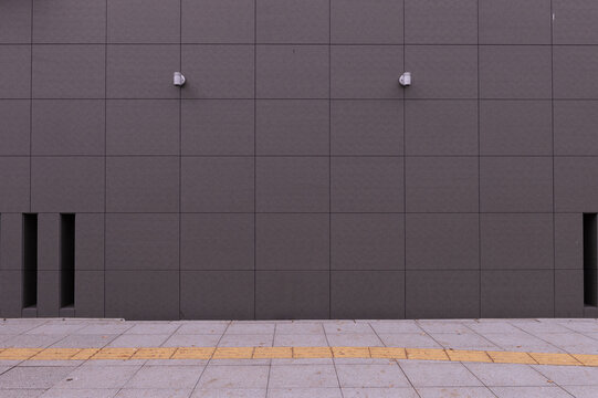 street wall background ,Industrial background, empty grunge urban street with warehouse brick wall