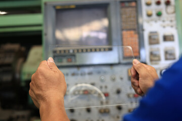 Engineer hand hold clear screen copy space background for feel free in put, Industrial and Technology concept ,Hands holding blank tablet,