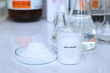 Sodium hydrosulfite in container, chemical analysis in laboratory