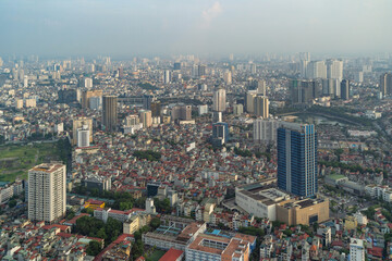 Fototapeta na wymiar Aerial view of Hanoi Downtown Skyline, Vietnam. Financial district and business centers in smart urban city in Asia. Skyscraper and high-rise buildings.