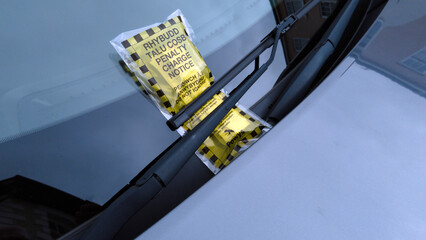 Bilingual parking ticket - obrazy, fototapety, plakaty