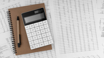 Naklejka na ściany i meble Calculator with notebook on financial documents. Financial concept.