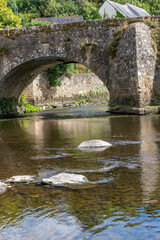 Fototapeta na wymiar Ancient stone bridge