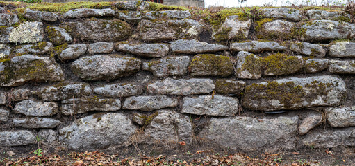 Old rustic stone fence