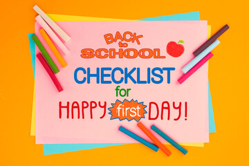 Tips to prepare for Back to School. Top view flat lay concept. Lettering, colored paper, multi-coloured letters, supplies for school