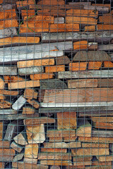 Old firewood for alternative heating in winter. Ecological energy, recycling of construction waste and debris