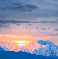 snowbound mountain chain at the sunrise, early morning mountain scene