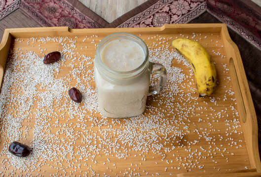 Healthy and quick calcium rich Breakfast smoothie made with amaranth or ramdana and banana dates. No sugar shake for fast and healthy weight loss. selective focus on subject. 