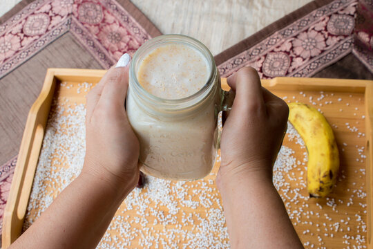 Healthy and quick calcium rich Breakfast smoothie made with amaranth or ramdana and banana dates. No sugar shake for fast and healthy weight loss. selective focus on subject. 