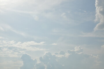 Fototapeta na wymiar Big cumulus clouds befor summer rain with sunlight