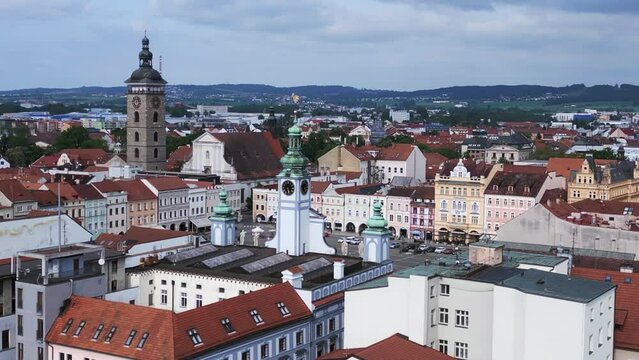 Budweis City hall with bell tower. Dramatic aerial top view flight drone