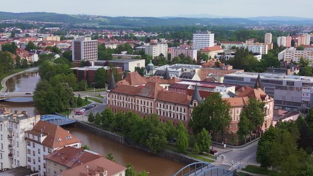 Budweis courthouse on the river. Fantastic aerial top view flight drone
