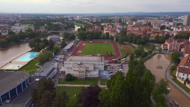 Czech Budweis city town river, Soccer field. Magic aerial top view flight drone