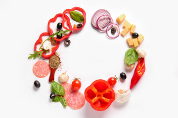 Frame made of ingredients for preparing pizza on white background