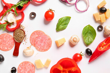 Ingredients for preparing pizza on white background