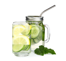 Glass and mason jar of infused water with cucumber slices on white background