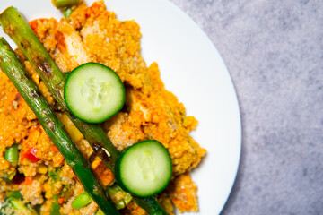 Close up of a healthy, protein and vitamin rich meal. Kasha with chicken and vegetables. A healthy and tasty diet