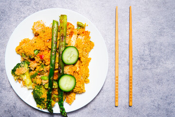 Close up of a healthy, protein and vitamin rich meal. Kasha with chicken and vegetables. A healthy and tasty diet