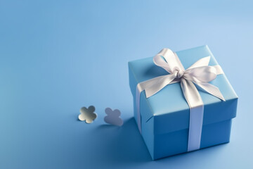 Obraz na płótnie Canvas Blue gift box on blue background. Father's day concept.. Generative ai