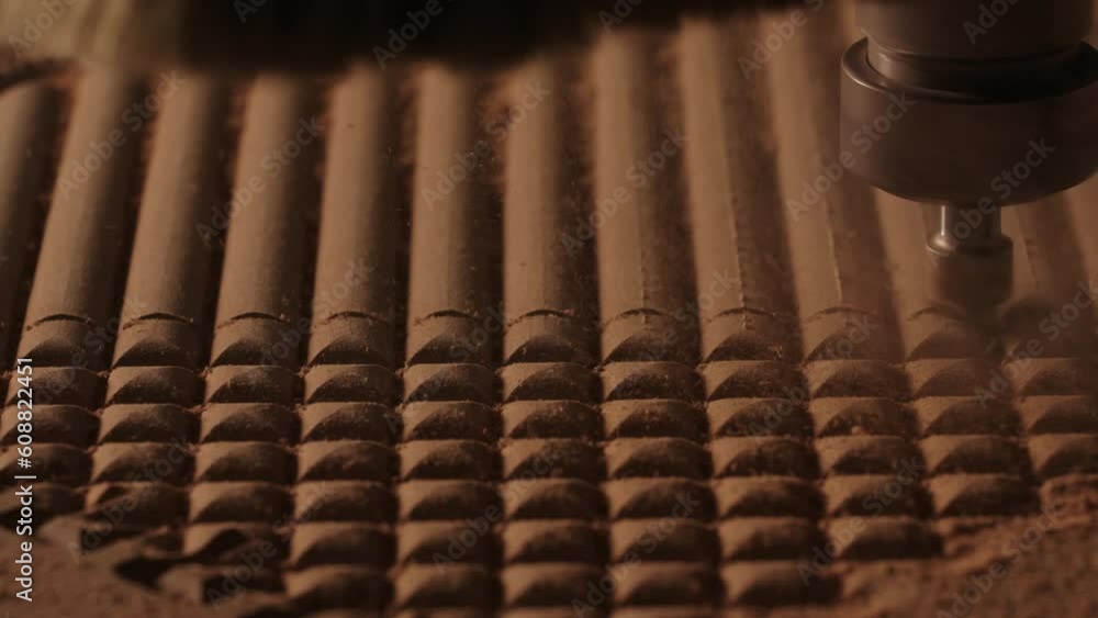 Poster close-up of machine for patterns on wood. creative. industrial machine with cutting needle on surfac