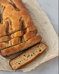 Banana bread. Сut into slices. On parchment paper