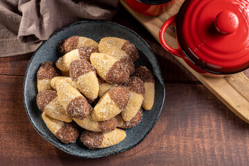 Shortbread biscuit covered with chocolate and crystallized sugar. In Brazil known as (Monteiro...